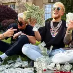 3_Jake-Paul-surrounded-by-money-dollar-bills
