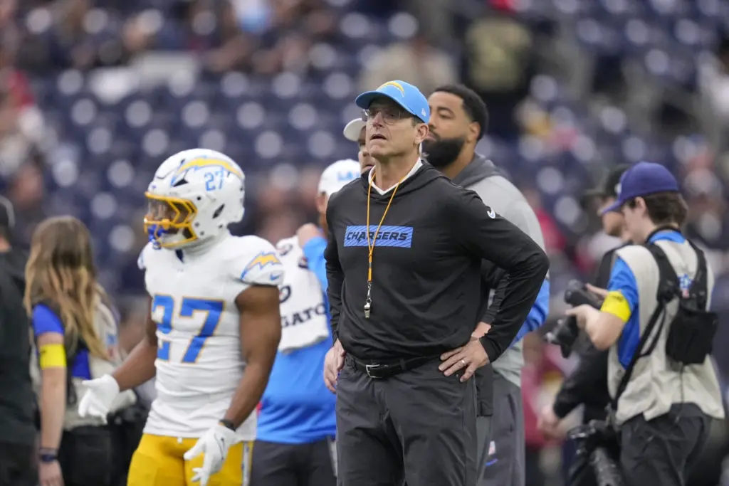 Jim Harbaugh Named in Lawsuit Over Weiss Scandal