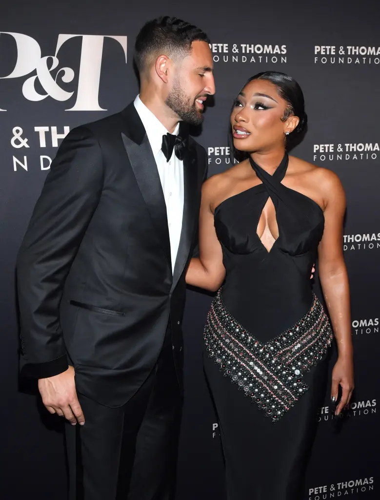 Klay Thompson & Megan Thee Stallion confirm romance on red carpet. Explore their $95–$110M net worth, career earnings, and cultural impact as a power couple.
