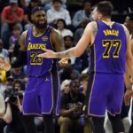 lebron-james-and-luka-doncic-react-during-a-game-between-the-los-angeles-lakers-and-memphis-grizzlies