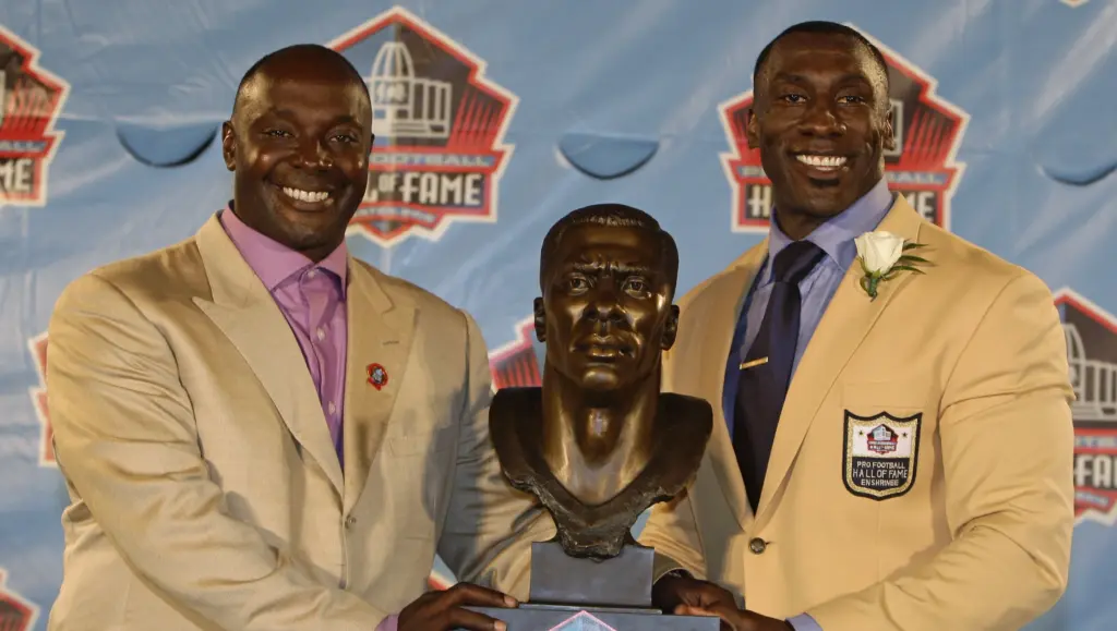 Shannon Sharpe settles a $50M rape lawsuit with confidential terms while maintaining his $30M net worth, growing podcast empire, and media dominance.