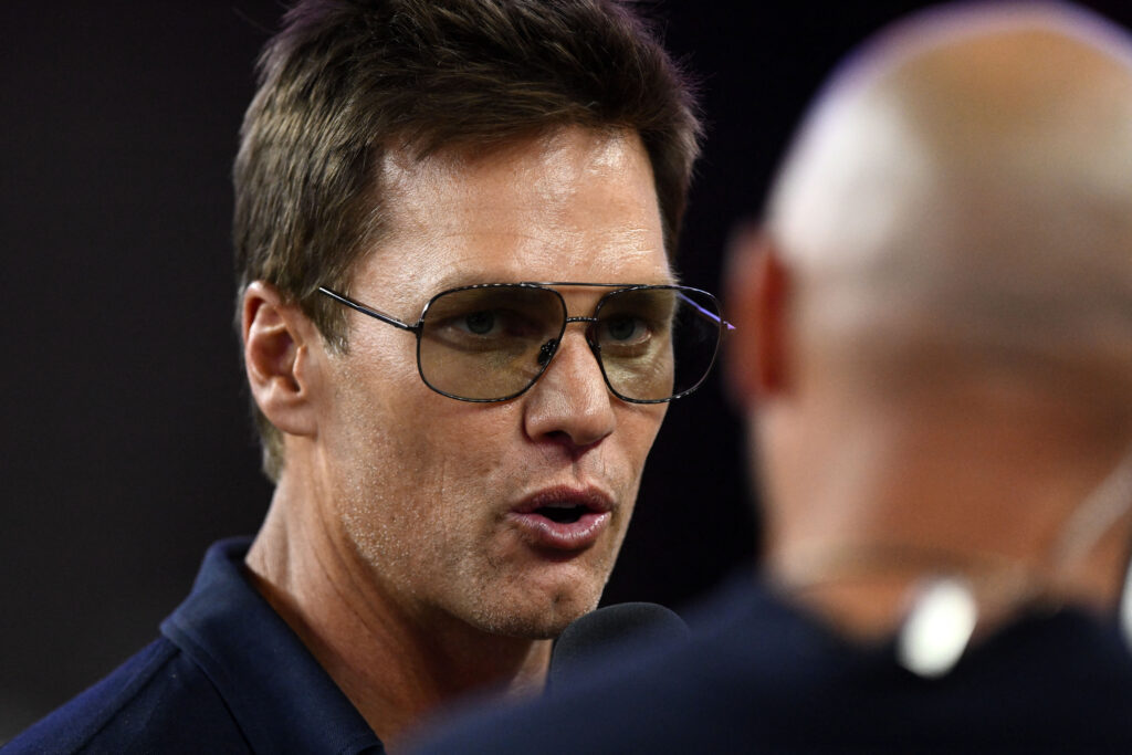 Tom Brady coaches booth