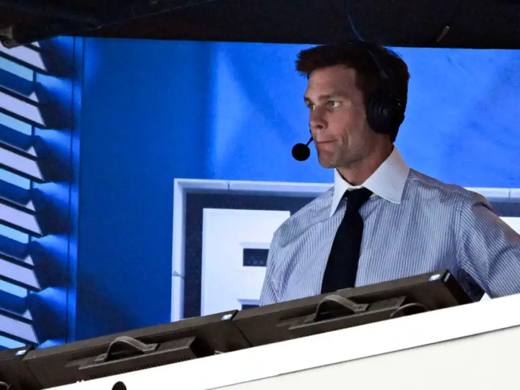 Tom Brady coaches booth
