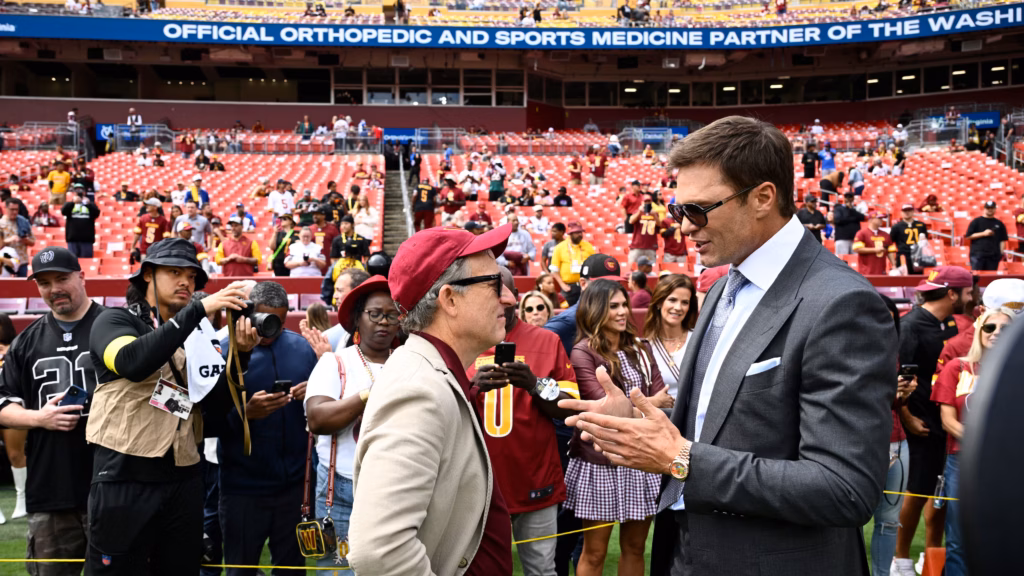 Tom Brady coaches booth